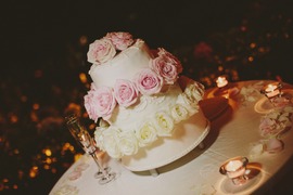 Wedding cake decorated with white and pink roses
