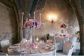 Pink and purple flowers for wedding banquet at Villa Cimbrone in Ravello