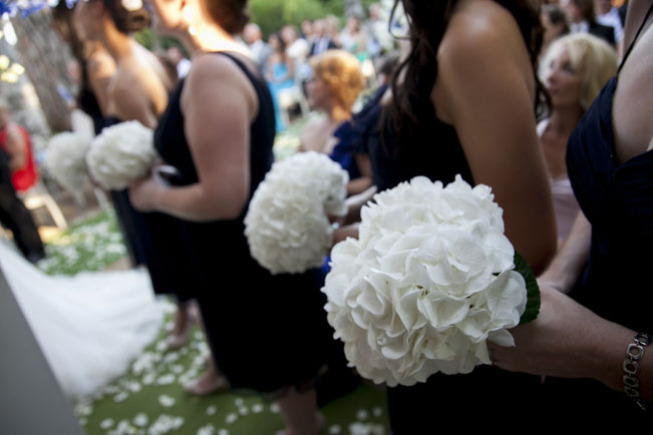 Bridesmaids' bouquets in total white