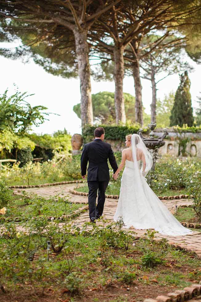 Bridal couple in the park of exclusive Villa in Ravello