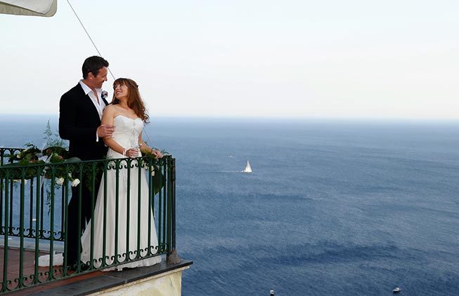 Bridal couple on a terrace with seaview in Positano