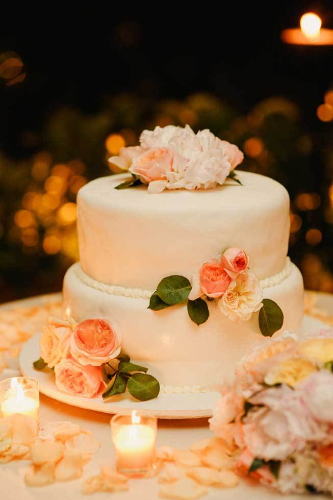Wedding cake with orange roses for wedding on the Amalfi Coast of Italy