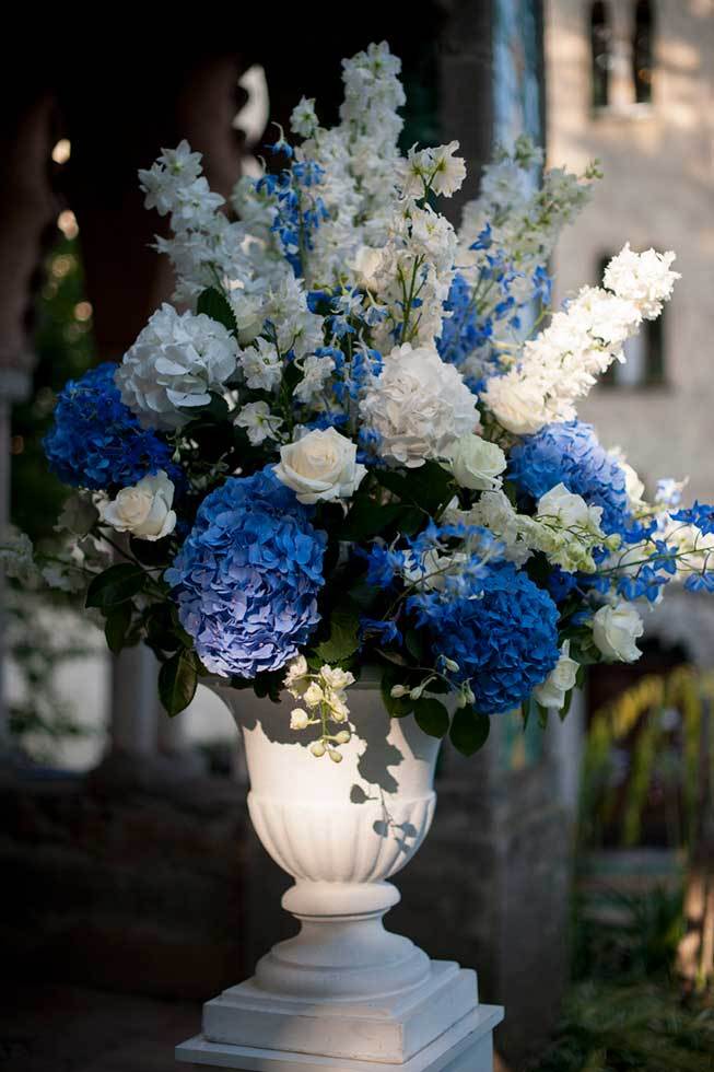 Flower decoration in white and blue for wedding ceremony in Ravello