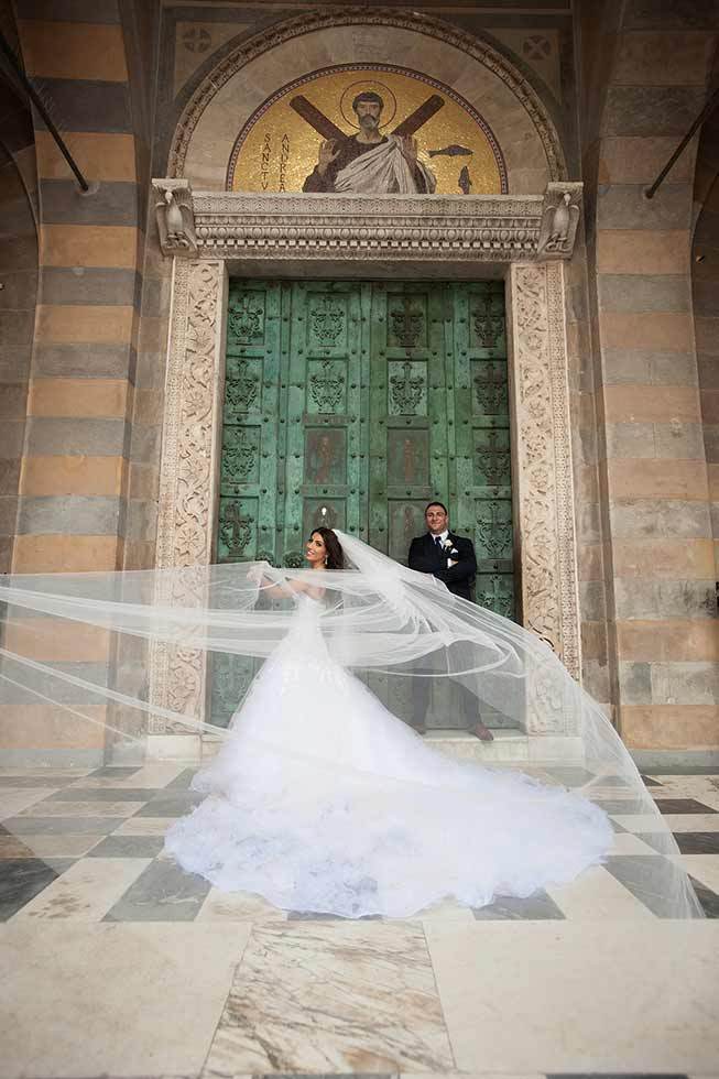 Stunning bridal gown with veil for wedding in Amalfi