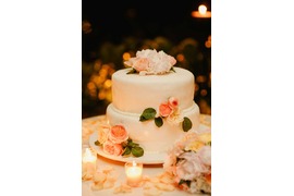 Wedding cake with orange roses for wedding on the Amalfi Coast of Italy