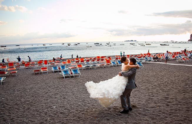 Bridal couple on the beach of Positano