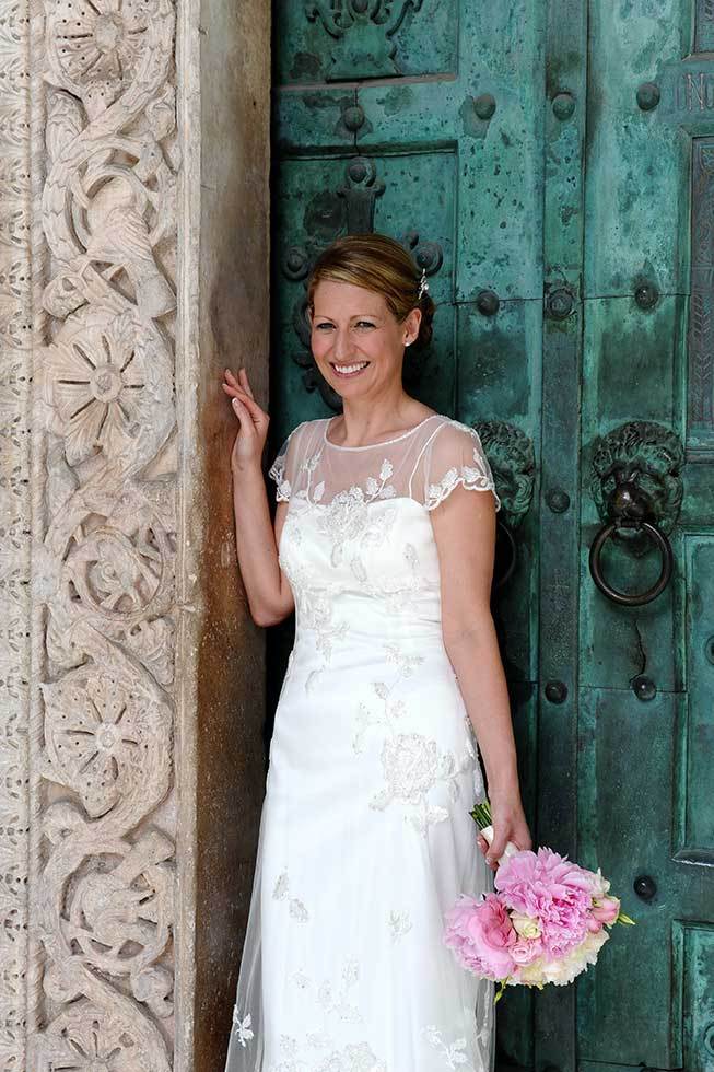 Portrait of a bride in front of the Amalfi Duomo