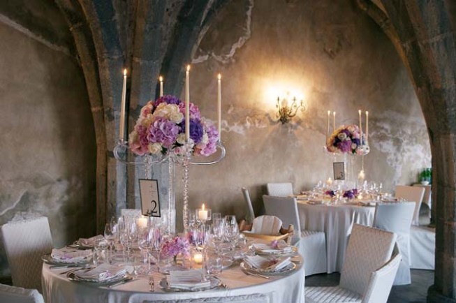 Pink and purple flowers for wedding banquet at Villa Cimbrone in Ravello